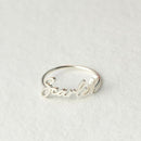 Meretriciousness Dainty Name Ring